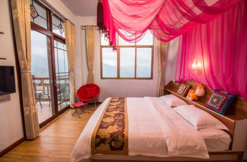 Imagen de la habitación del Casa de Huéspedes Longji Rice Terraces Green View Guesthouse. Foto 6