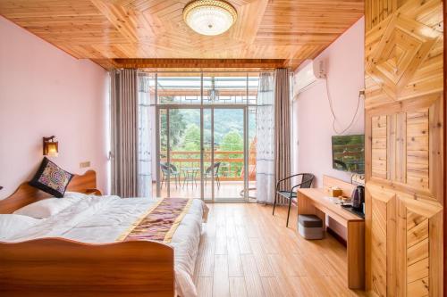 Imagen de la habitación del Casa de Huéspedes Longji Rice Terraces Green View Guesthouse. Foto 7