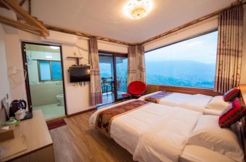 Imagen de la habitación del Casa de Huéspedes Longji Rice Terraces Green View Guesthouse. Foto 8