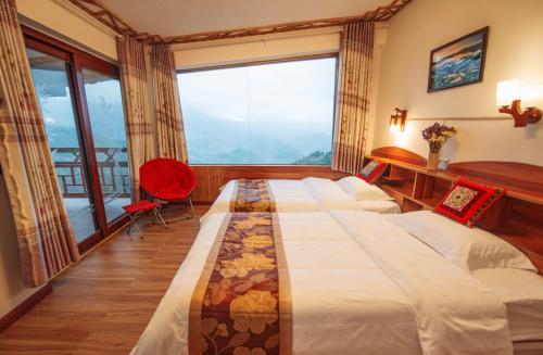 Imagen de la habitación del Casa de Huéspedes Longji Rice Terraces Green View Guesthouse. Foto 9