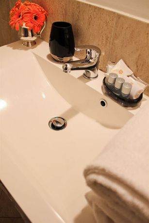 Imagen de la habitación del Casa de Huéspedes Magenta Collection Cancello. Foto 4