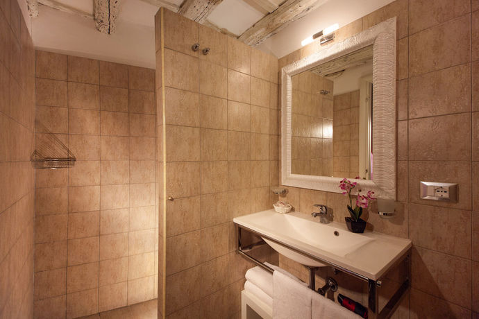 Imagen de la habitación del Casa de Huéspedes Magenta Collection Cancello. Foto 6