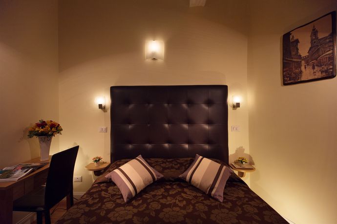 Imagen de la habitación del Casa de Huéspedes Magenta Collection Cancello. Foto 8