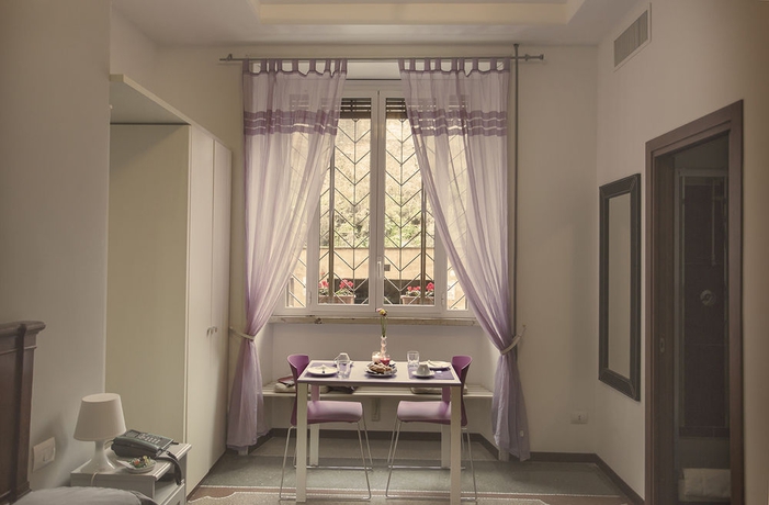 Imagen de la habitación del Casa de Huéspedes Maison Colosseo. Foto 4