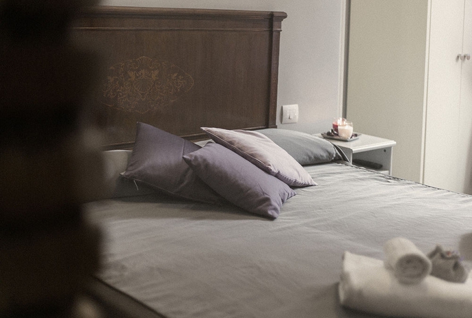 Imagen de la habitación del Casa de Huéspedes Maison Colosseo. Foto 6