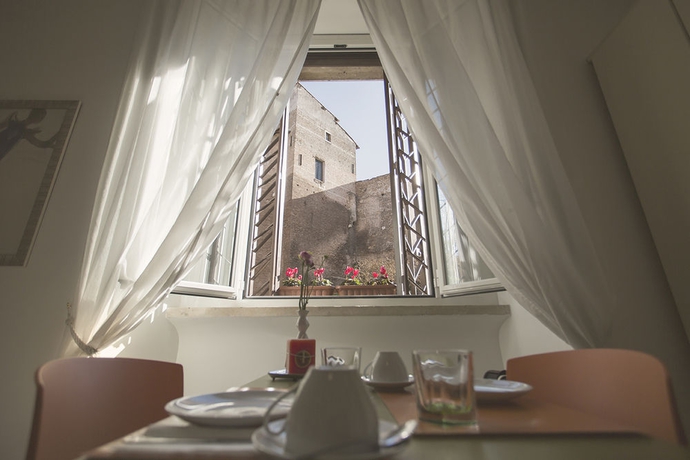 Imagen del bar/restaurante del Casa de Huéspedes Maison Colosseo. Foto 2