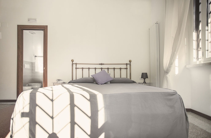 Imagen de la habitación del Casa de Huéspedes Maison Colosseo. Foto 10