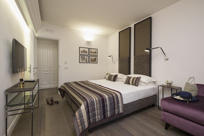 Imagen de la habitación del Casa de Huéspedes Maison Evelina. Foto 5