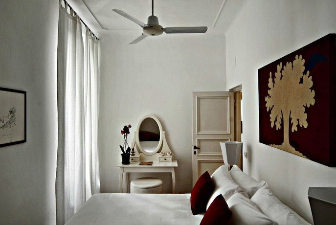Imagen de la habitación del Casa de Huéspedes Maison Evelina. Foto 8