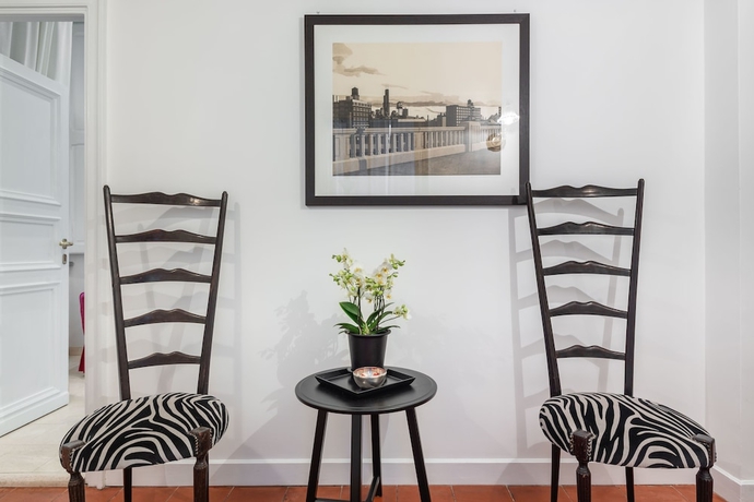 Imagen de la habitación del Casa de Huéspedes Maison Evelina. Foto 9