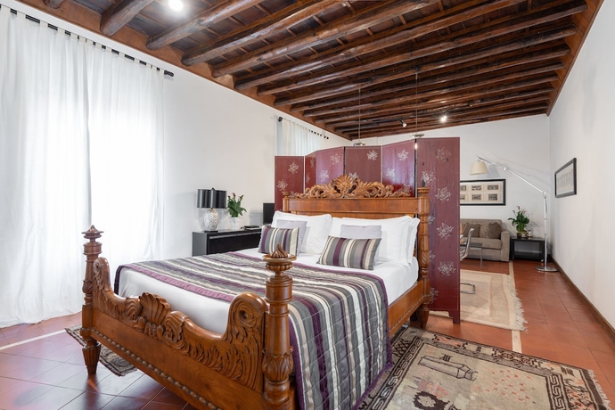 Imagen de la habitación del Casa de Huéspedes Maison Evelina. Foto 12