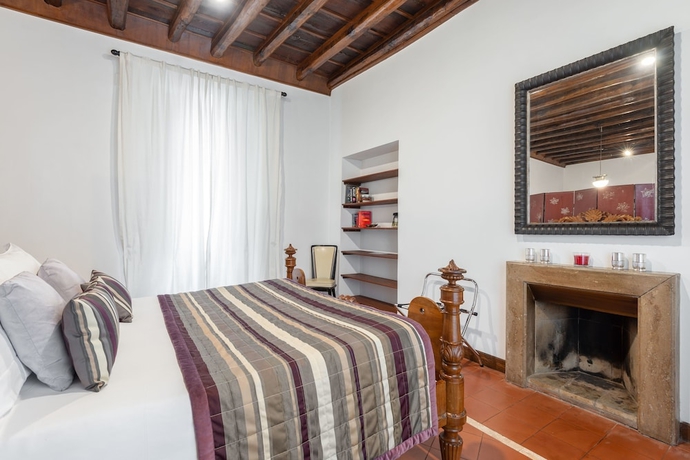 Imagen de la habitación del Casa de Huéspedes Maison Evelina. Foto 13