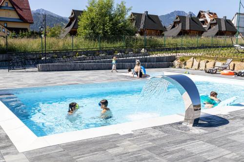 Imagen de la piscina del Casa de Huéspedes Malućko Chata. Foto 20
