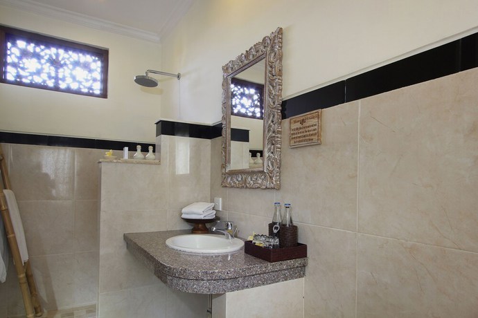 Imagen de la habitación del Casa de Huéspedes Mawa House By Pramana Villas. Foto 3
