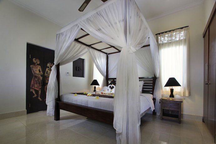 Imagen de la habitación del Casa de Huéspedes Mawa House By Pramana Villas. Foto 4