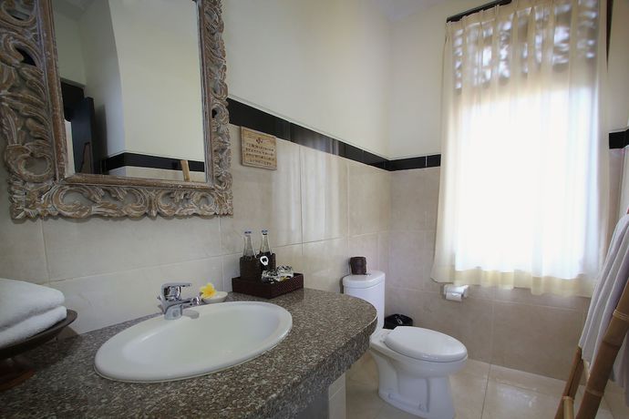 Imagen de la habitación del Casa de Huéspedes Mawa House By Pramana Villas. Foto 5