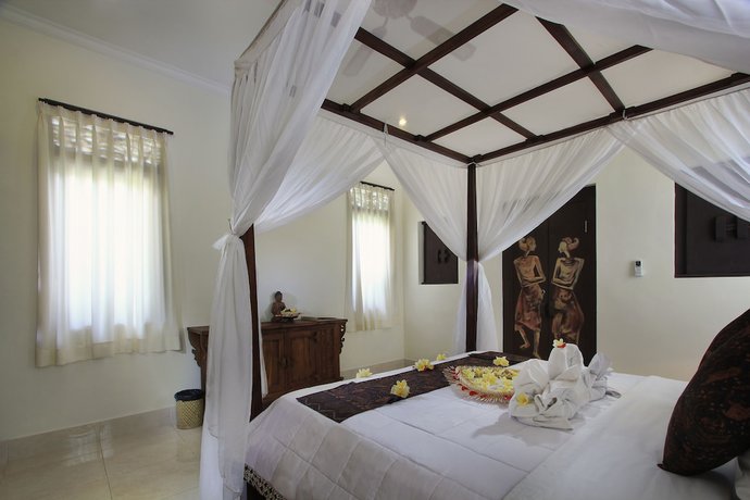 Imagen de la habitación del Casa de Huéspedes Mawa House By Pramana Villas. Foto 6