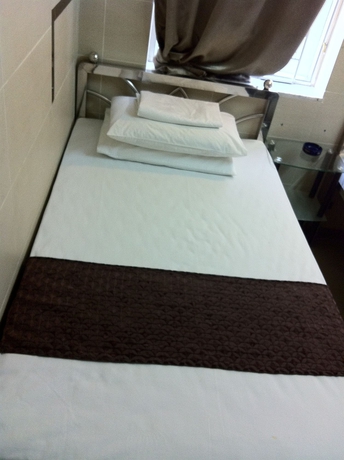 Imagen de la habitación del Casa de Huéspedes New Grand Guest House. Foto 7