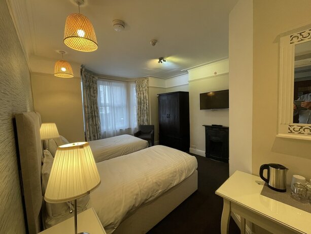 Imagen de la habitación del Casa de Huéspedes Newton House. Foto 15