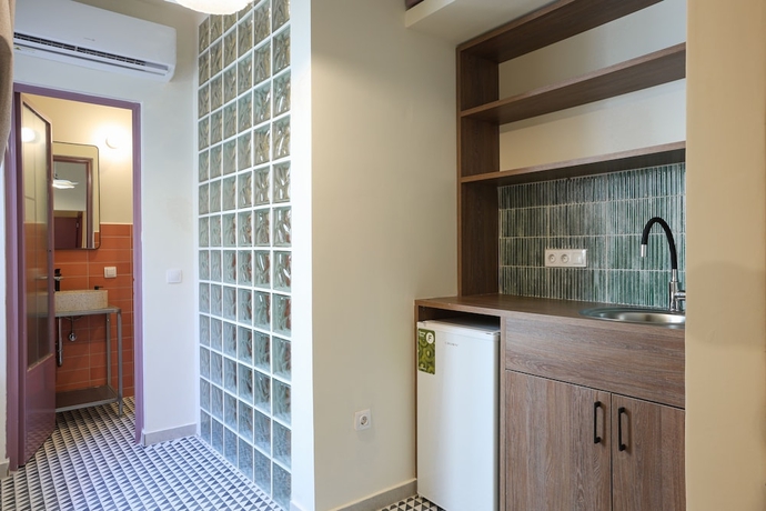 Imagen de la habitación del Casa de Huéspedes Next door Athens. Foto 12