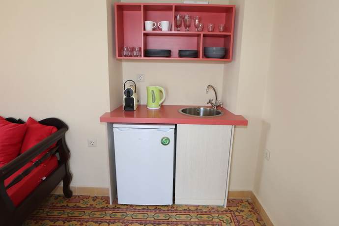 Imagen de la habitación del Casa de Huéspedes Nomikos Mansion. Foto 5