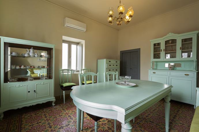 Imagen de la habitación del Casa de Huéspedes Nomikos Mansion. Foto 10