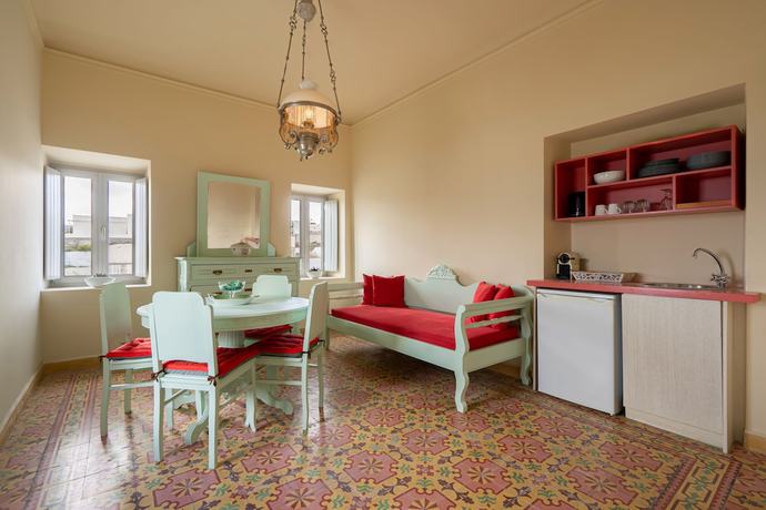 Imagen de la habitación del Casa de Huéspedes Nomikos Mansion. Foto 14