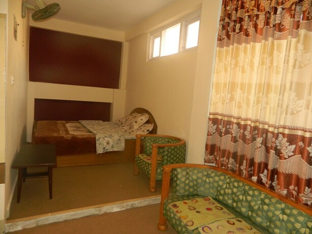 Imagen de la habitación del Casa de Huéspedes Om Tara Guest House. Foto 14