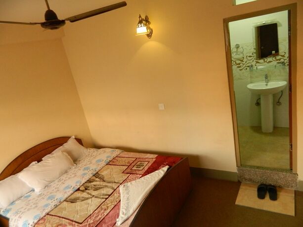 Imagen de la habitación del Casa de Huéspedes Om Tara Guest House. Foto 15