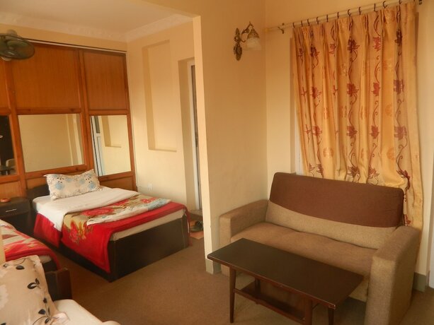 Imagen de la habitación del Casa de Huéspedes Om Tara Guest House. Foto 16