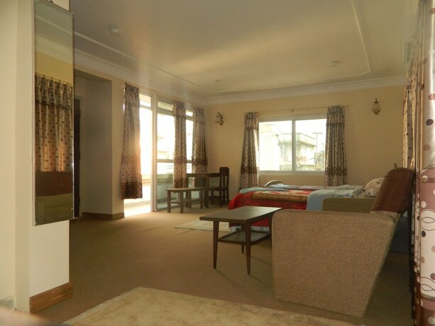 Imagen de la habitación del Casa de Huéspedes Om Tara Guest House. Foto 18