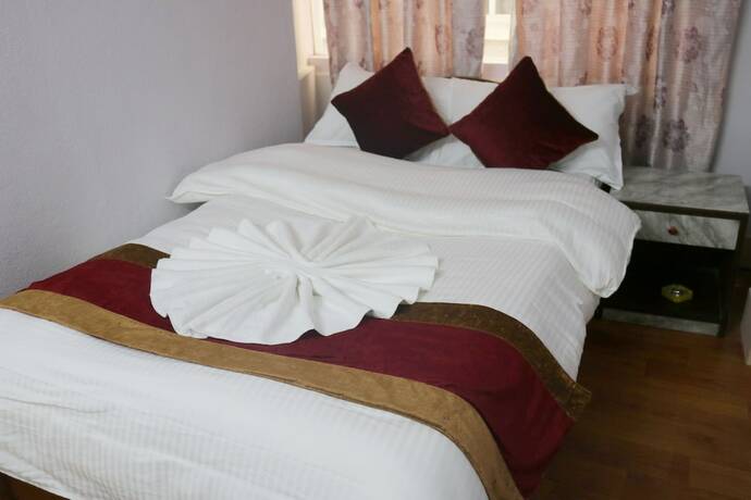 Imagen de la habitación del Casa de Huéspedes Om Tara Guest House. Foto 19