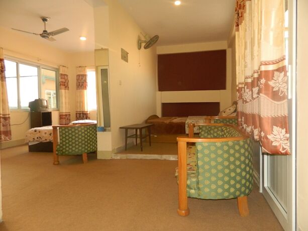 Imagen de la habitación del Casa de Huéspedes Om Tara Guest House. Foto 20