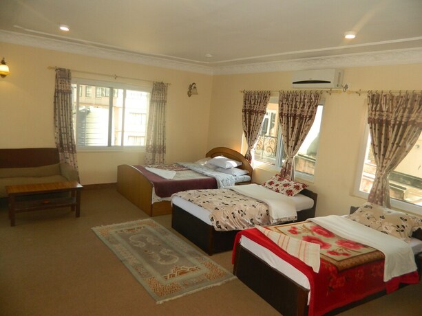 Imagen de la habitación del Casa de Huéspedes Om Tara Guest House. Foto 23