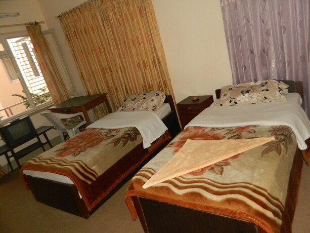 Imagen de la habitación del Casa de Huéspedes Om Tara Guest House. Foto 24