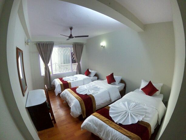 Imagen de la habitación del Casa de Huéspedes Om Tara Guest House. Foto 25