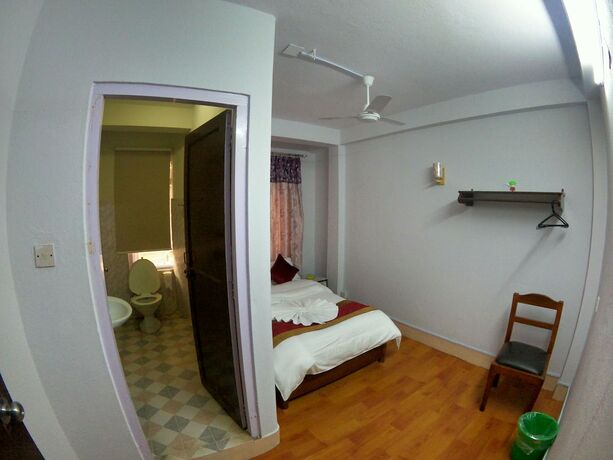 Imagen de la habitación del Casa de Huéspedes Om Tara Guest House. Foto 26