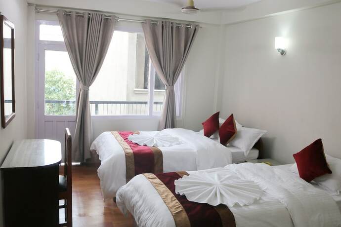 Imagen de la habitación del Casa de Huéspedes Om Tara Guest House. Foto 27