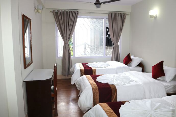 Imagen de la habitación del Casa de Huéspedes Om Tara Guest House. Foto 33