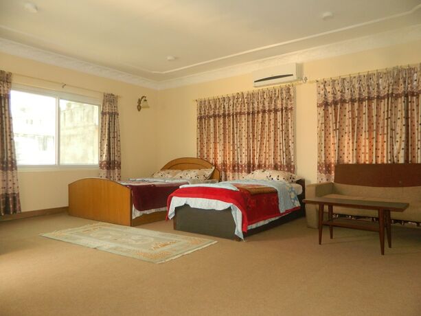 Imagen de la habitación del Casa de Huéspedes Om Tara Guest House. Foto 34