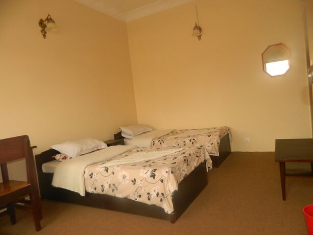 Imagen de la habitación del Casa de Huéspedes Om Tara Guest House. Foto 35