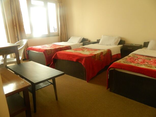Imagen de la habitación del Casa de Huéspedes Om Tara Guest House. Foto 36
