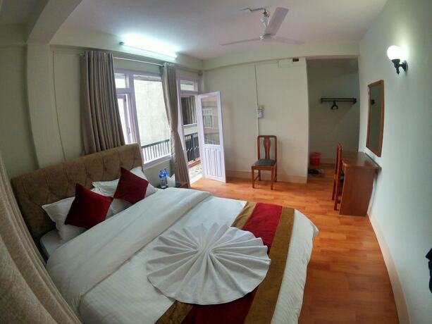 Imagen de la habitación del Casa de Huéspedes Om Tara Guest House. Foto 37