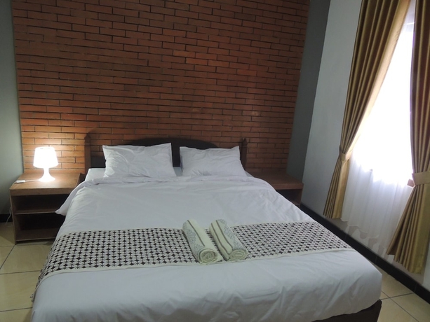 Imagen de la habitación del Casa de Huéspedes Omah Mardi Syariah by Ndalem Beong. Foto 2