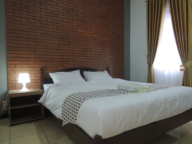 Imagen de la habitación del Casa de Huéspedes Omah Mardi Syariah by Ndalem Beong. Foto 4