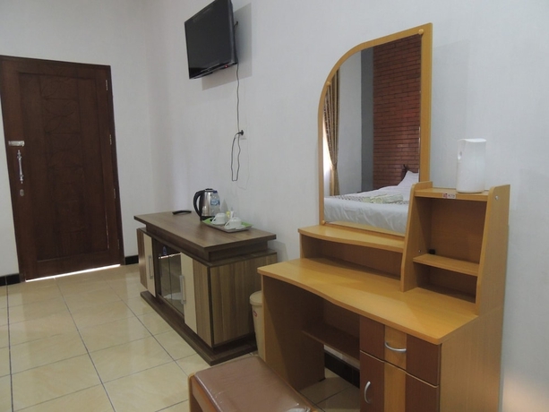 Imagen de la habitación del Casa de Huéspedes Omah Mardi Syariah by Ndalem Beong. Foto 9
