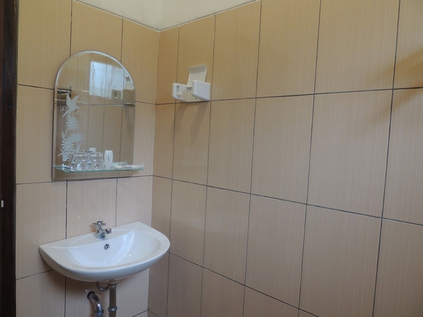 Imagen de la habitación del Casa de Huéspedes Omah Mardi Syariah by Ndalem Beong. Foto 17