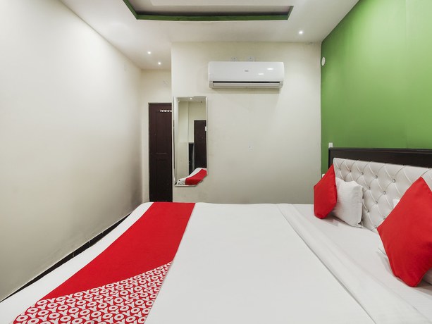 Imagen de la habitación del Casa de Huéspedes Oyo 14224 Happy Guest House. Foto 9