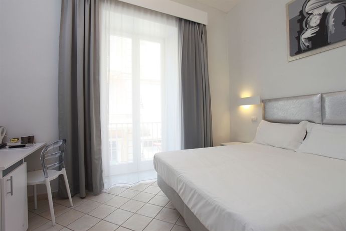 Imagen de la habitación del Casa de Huéspedes Palazzo Tasso. Foto 10