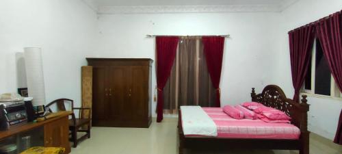 Imagen de la habitación del Casa de Huéspedes Penginapan Pendopo Kasih. Foto 11
